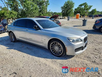 Czwarte zdjęcie samochodu z boku: 2014 BMW 750 LXI VIN:WBAYF8C50ED653819 - miniatura