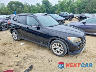 Czwarte zdjęcie samochodu z boku: 2014 BMW X1 XDRIVE28I VIN:WBAVL1C54EVY17506 - miniatura
