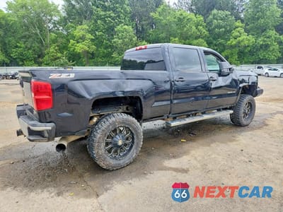 Trzecie zdjęcie samochodu z tyłu: 2015 CHEVROLET SILVERADO K2500 HEAVY DUTY LT VIN:1GC1KVE83FF105681 - miniatura