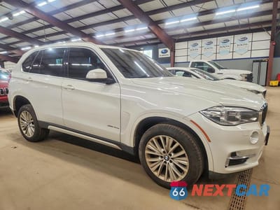 Czwarte zdjęcie samochodu z boku: 2016 BMW X5 XDR40E VIN:5UXKT0C58G0S78614 - miniatura