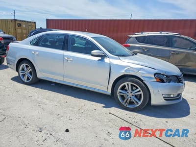 Czwarte zdjęcie samochodu z boku: 2015 VOLKSWAGEN PASSAT SE VIN:1VWBV7A35FC099737 - miniatura