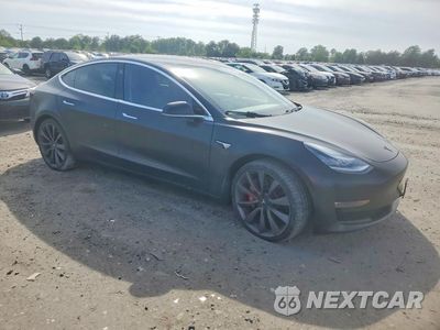 Czwarte zdjęcie samochodu z boku: 2020 TESLA MODEL 3 VIN:5YJ3E1EC6LF713143 - miniatura