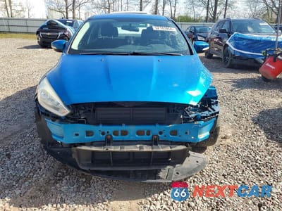 Piąte zdjęcie samochodu w środku: 2017 FORD FOCUS SE VIN:1FADP3F26HL250818 - miniatura