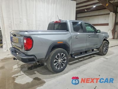 Trzecie zdjęcie samochodu z tyłu: 2025 GMC CANYON DENALI VIN:1GTP2FEK5S1243368 - miniatura