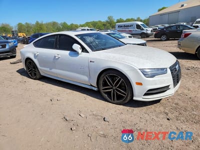 Czwarte zdjęcie samochodu z boku: 2016 AUDI A7 PREMIUM PLUS VIN:WAUWGBFC3GN069438 - miniatura