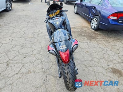 Czwarte zdjęcie samochodu z boku: 2011 SUZUKI GSX1300 R VIN:JS1GX72A4B2100760 - miniatura