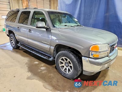Czwarte zdjęcie samochodu z boku: 2002 GMC YUKON XL K1500 VIN:3GKFK16Z32G320612 - miniatura