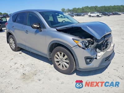Czwarte zdjęcie samochodu z boku: 2015 MAZDA CX-5 TOURING VIN:JM3KE2CY2F0535046 - miniatura
