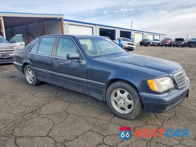 Czwarte zdjęcie samochodu z boku: 1997 MERCEDES-BENZ S 420 VIN:WDBGA43GXVA352384 - miniatura