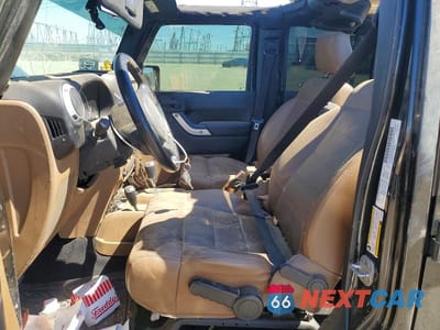 Zdjęcie 7 z 13 samochodu: 2012 JEEP WRANGLER UNLIMITED SAHARA VIN:1C4HJWEG2CL134598 - miniatura