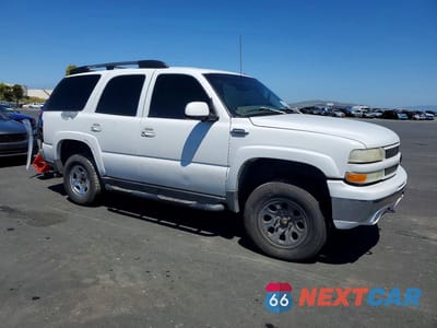 Czwarte zdjęcie samochodu z boku: 2002 CHEVROLET TAHOE K1500 VIN:1GNEK13Z92R139260 - miniatura