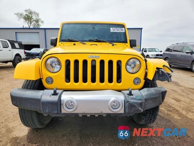 Piąte zdjęcie samochodu w środku: 2015 JEEP WRANGLER SAHARA VIN:1C4AJWBG5FL725356 - miniatura