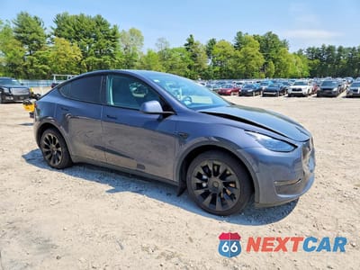 Czwarte zdjęcie samochodu z boku: 2023 TESLA MODEL Y VIN:7SAYGDEE2PF760102 - miniatura