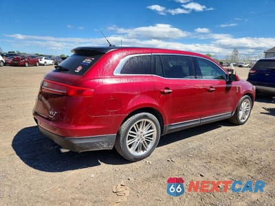 Trzecie zdjęcie samochodu z tyłu: 2014 LINCOLN MKT VIN:2LMHJ5AT1EBL58073 - miniatura