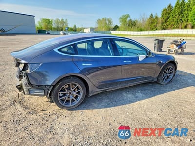 Trzecie zdjęcie samochodu z tyłu: 2018 TESLA MODEL 3 VIN:5YJ3E1EB0JF128482 - miniatura