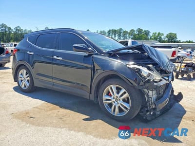 Czwarte zdjęcie samochodu z boku: 2014 HYUNDAI SANTA FE VIN:5XYZW3LA6EG140230 - miniatura