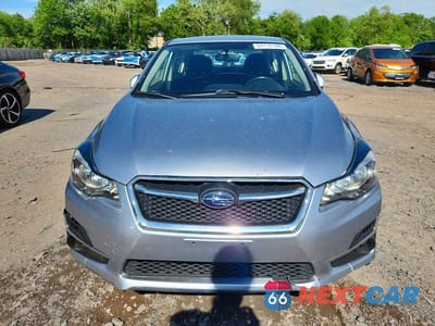 Piąte zdjęcie samochodu w środku: 2016 SUBARU IMPREZA PREMIUM VIN:JF1GJAB6XGH017277 - miniatura