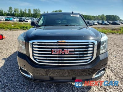 Piąte zdjęcie samochodu w środku: 2018 GMC YUKON SLT VIN:1GKS2BKC3JR321585 - miniatura