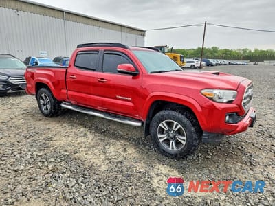 Czwarte zdjęcie samochodu z boku: 2016 TOYOTA TACOMA TRD SPORT VIN:3TMDZ5BN2GM008315 - miniatura