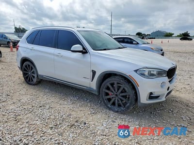 Czwarte zdjęcie samochodu z boku: 2014 BMW X5 XDRIVE35I VIN:5UXKR0C54E0H16365 - miniatura