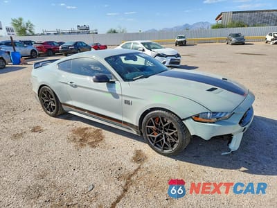Czwarte zdjęcie samochodu z boku: 2022 FORD MUSTANG MACH I VIN:1FA6P8R0XN5552516 - miniatura