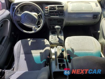 Zdjęcie 8 z 12 samochodu: 1999 CHEV TRACKER VIN:2CNBJ13C9X6912866 - miniatura