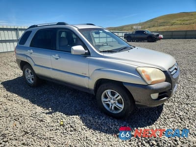Czwarte zdjęcie samochodu z boku: 2006 KIA SPORTAGE LX VIN:KNDJE723067240798 - miniatura