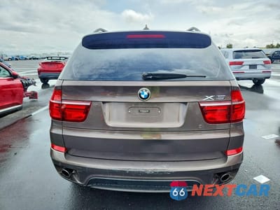 Zdjęcie 6 z 13 samochodu: 2013 BMW X5 XDRIVE35I VIN:5UXZV4C55D0B17314 - miniatura