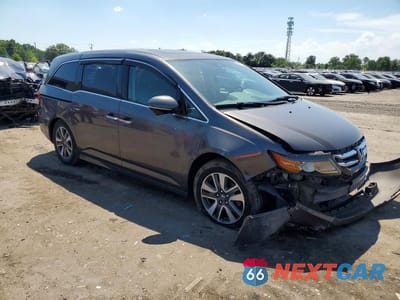 Czwarte zdjęcie samochodu z boku: 2014 HONDA ODYSSEY TOURING VIN:5FNRL5H97EB074295 - miniatura