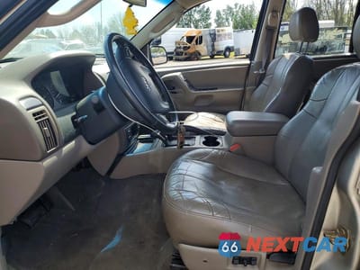 Zdjęcie 7 z 12 samochodu: 2003 JEEP GRAND CHEROKEE LAREDO VIN:1J4GW48N53C554507 - miniatura