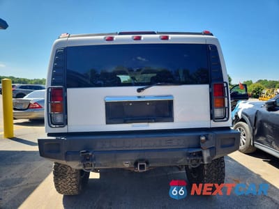 Zdjęcie 6 z 12 samochodu: 2003 HUMMER H2 VIN:5GRGN23U43H130412 - miniatura