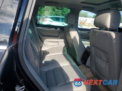 Zdjęcie 11 z 13 samochodu: 2004 VOLKSWAGEN TOUAREG 4.2 VIN:WVGEM77L14D064478 - miniatura
