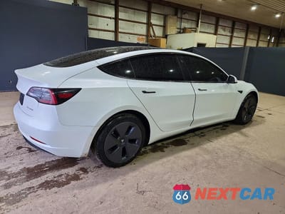 Trzecie zdjęcie samochodu z tyłu: 2022 TESLA MODEL 3 VIN:5YJ3E1EB5NF117595 - miniatura