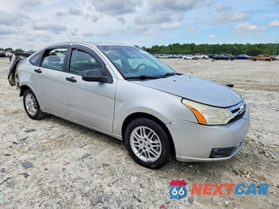 Czwarte zdjęcie samochodu z boku: 2010 FORD FOCUS SE VIN:1FAHP3FNXAW156859 - miniatura