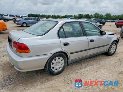 Trzecie zdjęcie samochodu z tyłu: 1999 HONDA CIVIC LX VIN:1HGEJ6678XL058068 - miniatura
