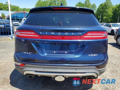 Zdjęcie 6 z 13 samochodu: 2015 LINCOLN MKC VIN:5LMCJ2A94FUJ00695 - miniatura