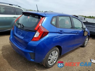 Trzecie zdjęcie samochodu z tyłu: 2015 HONDA FIT LX VIN:3HGGK5H56FM771804 - miniatura