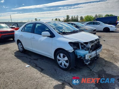 Czwarte zdjęcie samochodu z boku: 2010 TOYOTA YARIS BASE VIN:JTDBT4K30A1358516 - miniatura