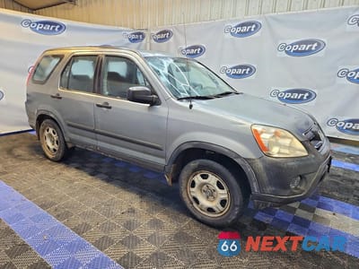 Czwarte zdjęcie samochodu z boku: 2005 HONDA CR-V LX VIN:SHSRD68595U309370 - miniatura