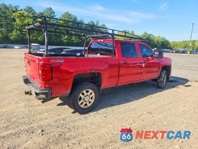 Trzecie zdjęcie samochodu z tyłu: 2015 CHEVROLET SILVERADO K2500 HEAVY DUTY LT VIN:1GC1KVEG2FF171744 - miniatura
