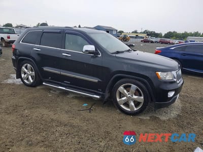 Czwarte zdjęcie samochodu z boku: 2012 JEEP GRAND CHEROKEE OVERLAND VIN:1C4RJFCT7CC321422 - miniatura