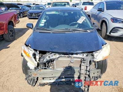 Piąte zdjęcie samochodu w środku: 2011 TOYOTA YARIS BASE VIN:JTDBT4K30B1406243 - miniatura