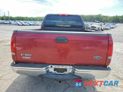 Zdjęcie 6 z 12 samochodu: 2003 FORD F150 VIN:1FTRX172X3NA44563 - miniatura