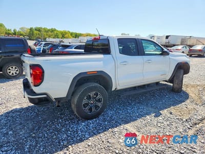 Trzecie zdjęcie samochodu z tyłu: 2024 GMC CANYON ELEVATION VIN:1GTP6BEK1R1315349 - miniatura