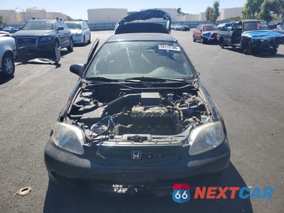 Piąte zdjęcie samochodu w środku: 1999 HONDA CIVIC DX VIN:2HGEJ6345XH112613 - miniatura