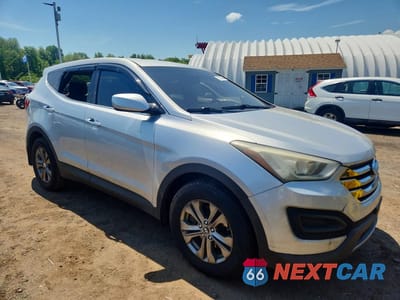 Czwarte zdjęcie samochodu z boku: 2014 HYUNDAI SANTA FE SPORT 2.4L VIN:5XYZTDLB6EG159125 - miniatura