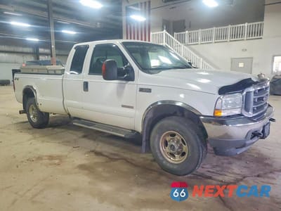 Czwarte zdjęcie samochodu z boku: 2004 FORD F350 SRW SUPER DUTY VIN:1FTSX31P14EB14356 - miniatura