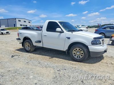 Czwarte zdjęcie samochodu z boku: 2003 FORD F150 VIN:1FTRF07W13KB66729 - miniatura