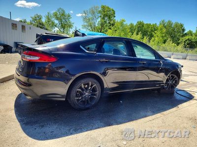 Trzecie zdjęcie samochodu z tyłu: 2019 FORD FUSION SE VIN:3FA6P0HD2KR246814 - miniatura