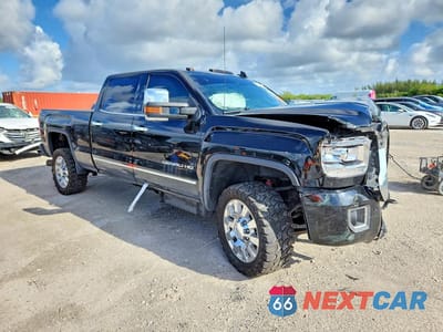 Czwarte zdjęcie samochodu z boku: 2016 GMC SIERRA K2500 DENALI VIN:1GT12UE85GF298248 - miniatura